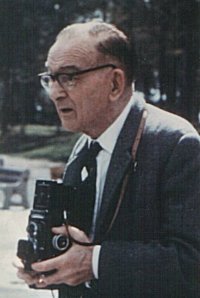11k jpg - photo of Cyril Fagan holding a camera